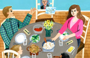 夕食が並んだ食卓を囲みすわっている家族椅子の一つにテープで写真が貼られています。